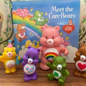 Vintage Care Bears toy figures and book
